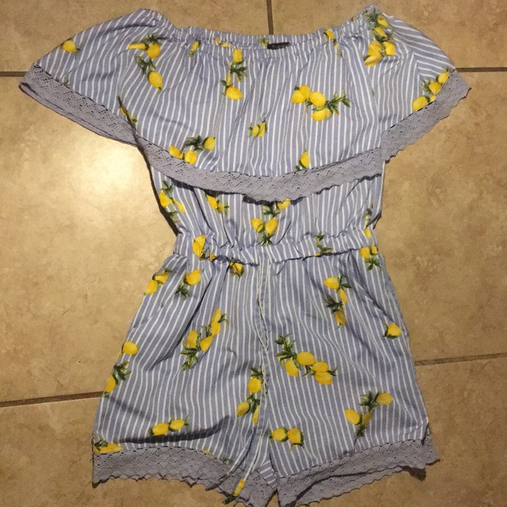 Blue and white striped romper with lemons.
